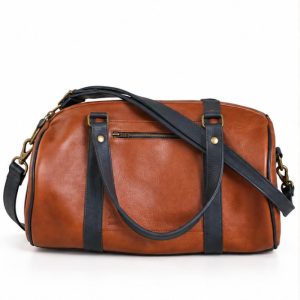 Petit Voyageur, sac cylindrique en cuir pleine fleur fabriqué artisanalement par Dagot Cuir