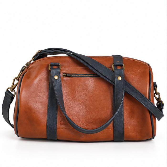 Petit Voyageur, sac cylindrique en cuir pleine fleur fabriqué artisanalement par Dagot Cuir